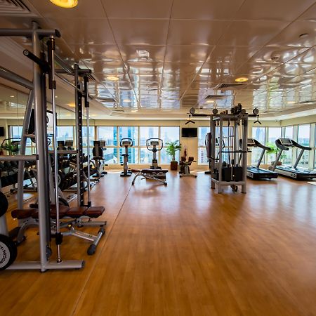 Grand Mercure Majlis Residences Abu Dhabi Luaran gambar A gym in a hotel