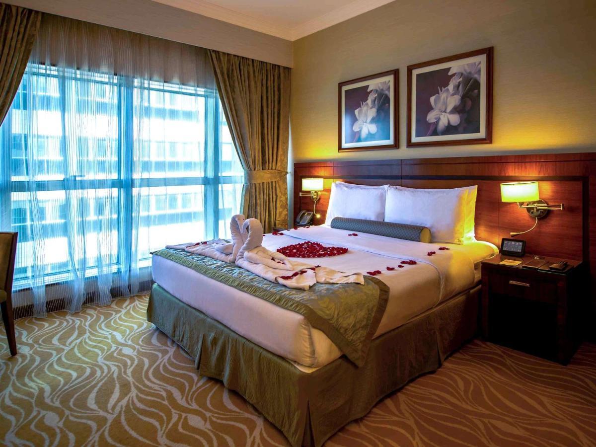 Grand Mercure Majlis Residences Abu Dhabi Luaran gambar A bedroom at the hotel